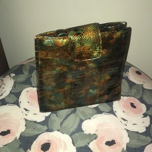 Paul Melia’s leather clutch purse